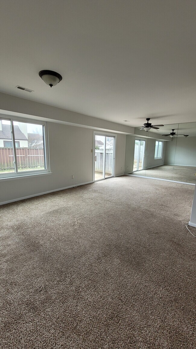 Living+Dining Room and entry to the backyard - 476 Bridge St