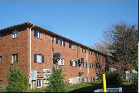 Building Photo - The Red Brick Apartments