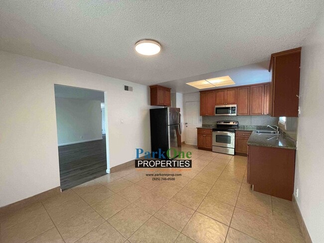 Building Photo - House With Paved Side Yard and Spacious Backyard in Pinole Now Available!!