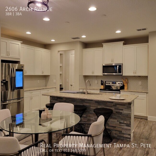 Building Photo - LUXURIOUS OLDSMAR TOWNHOUSE