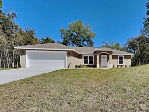 Building Photo - 10465 N Spaulding Dr