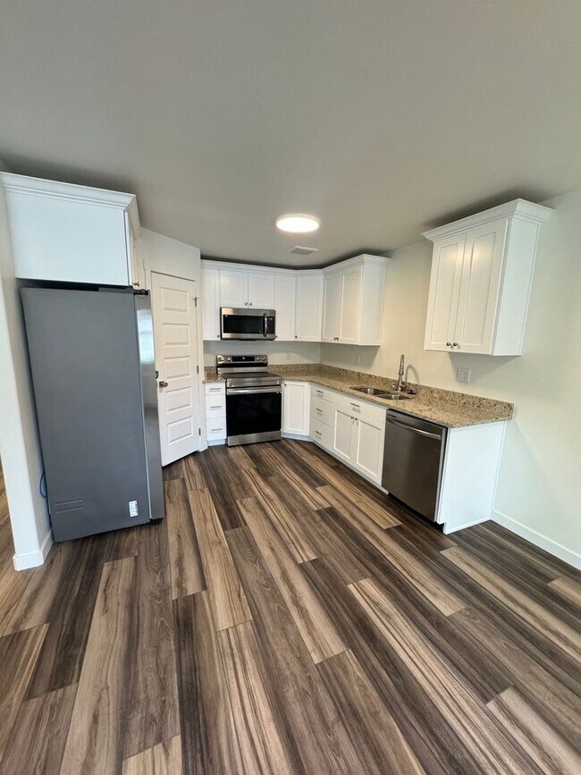 Building Photo - HALF FIRST MONTHS RENT FREE!!Brand New & M...