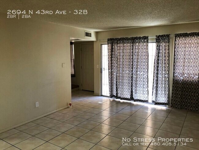 Building Photo - 2 Bed Condo At 43rd Ave and Thomas!