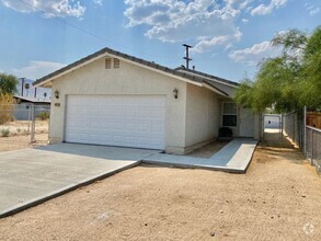 Building Photo - 6442 Smoketree Ave