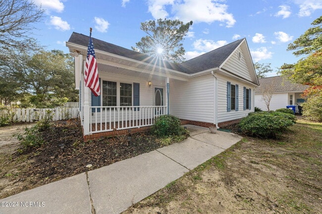 Building Photo - 7507 E Oak Island Dr