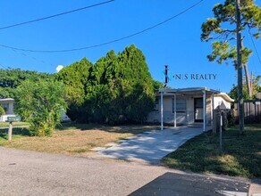 Building Photo - 7327-7329 Buchanan Dr