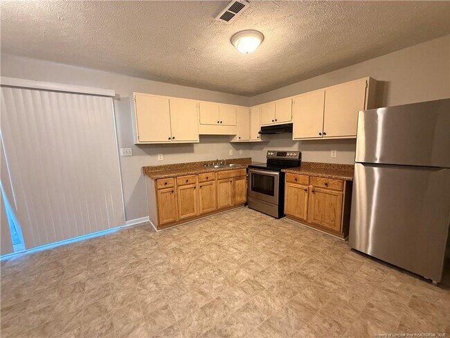 Foto del edificio - 5833 Aftonshire Dr