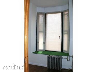 Building Photo - 4 br, 2 bath Apartment - 140 E 7th St