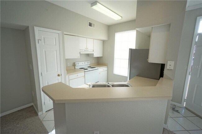 Foto del edificio - 9574 Lake Chase Island Way