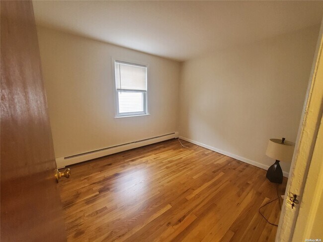 Building Photo - 66-46 79th Pl