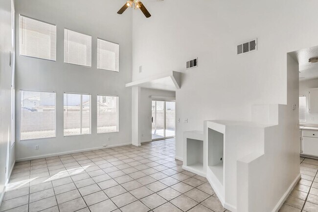 Building Photo - 3 Bedroom, 2 Story Home with Vaulted Ceili...