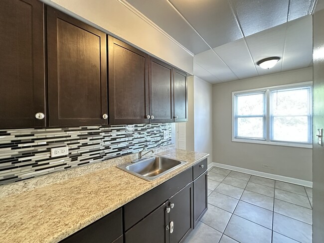 Building Photo - 3820 25th Ave