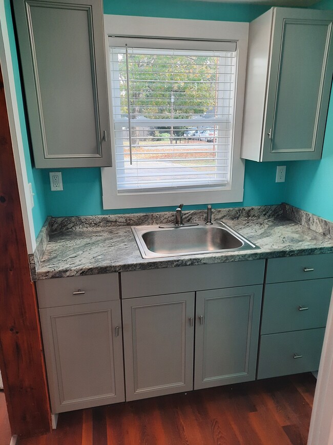 new cabinets sink hallway to bathroom and bedroom - 86 Forest St