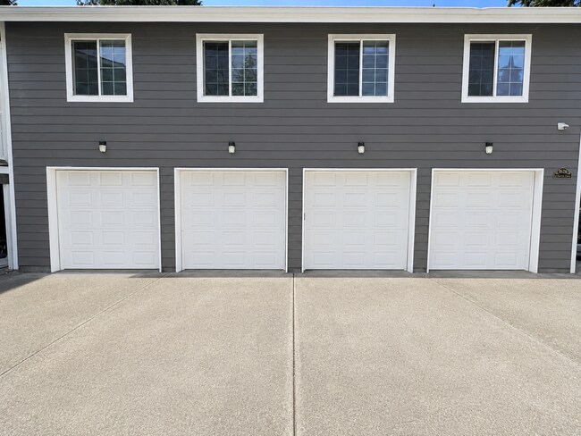 Building Photo - Elevated 3-Bedroom Home with Secure Garage & Cozy Living Space