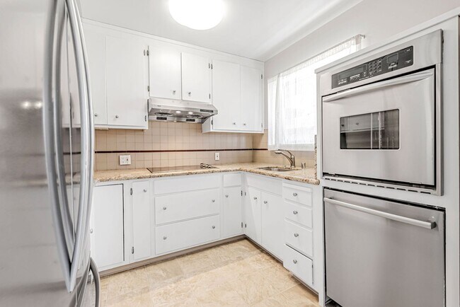 Foto del edificio - Charming 2-Bedroom Condo in Downtown Palo ...