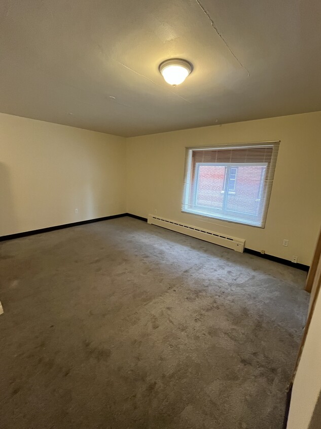 Living Room - carpet will be cleaned prior to move in - 8428 W Lisbon Ave