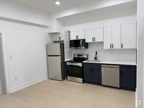 Building Photo - 1012 W Lanvale St