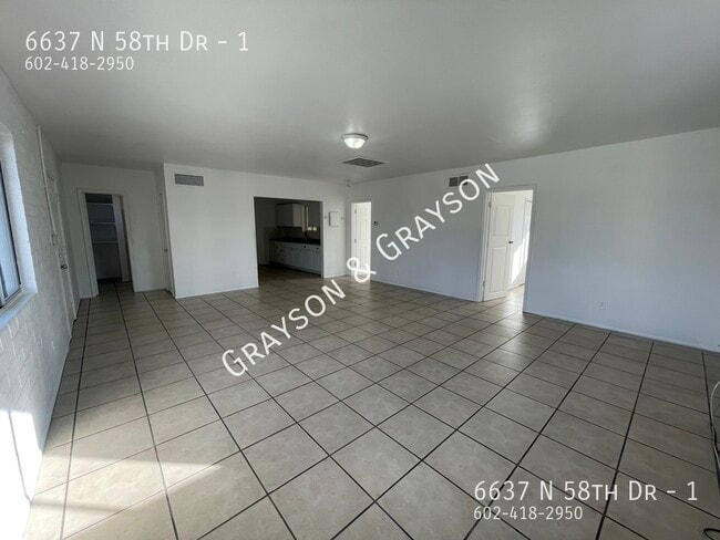 Building Photo - 6637 N 58th Dr