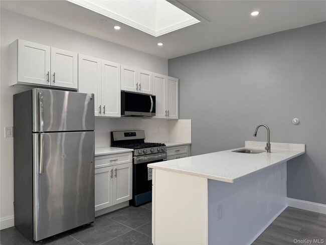 Building Photo - 209-211-211 Main St