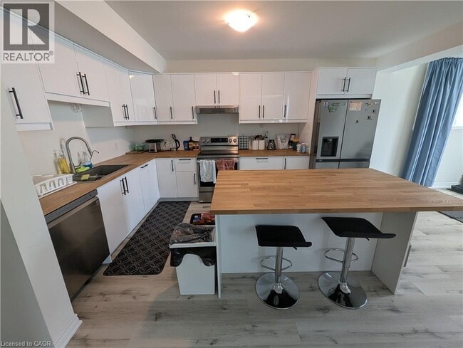 Photo du bâtiment - 4202 Manson Ln