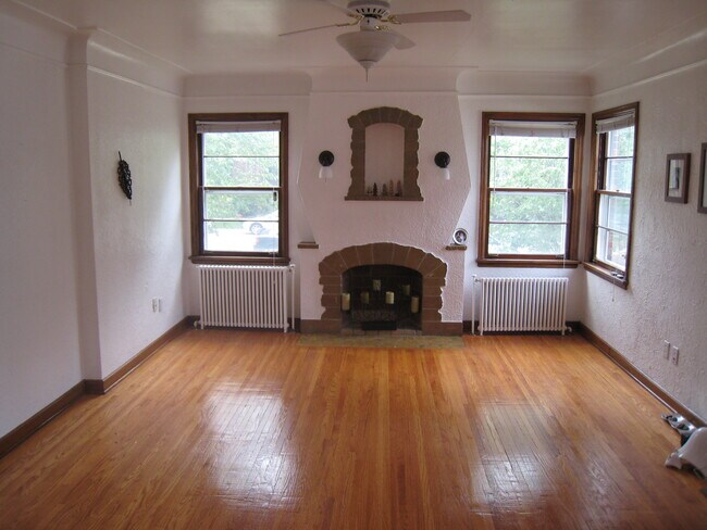 Livingroom with Faux Fireplace - 1531 Portland Ave