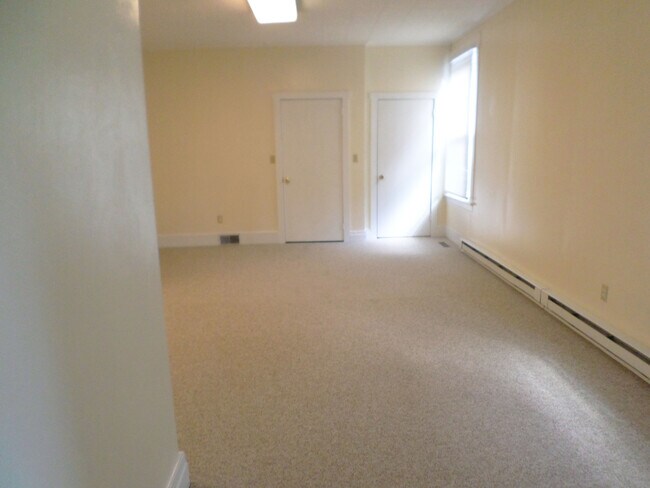 Living room from kitchen doorway. New Carpet! - 111 Pennview Ln
