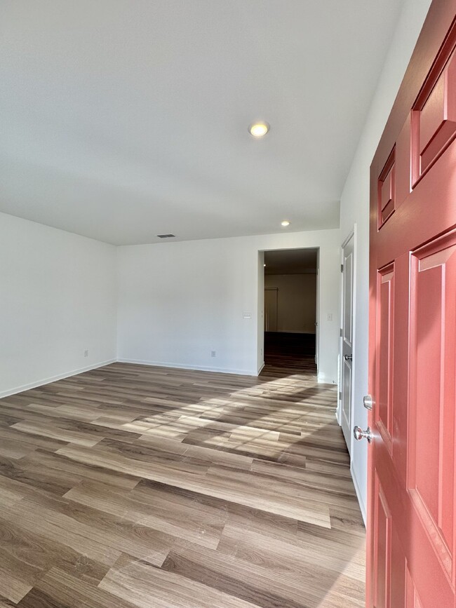 Building Photo - Be the first to live in this spacious bran...