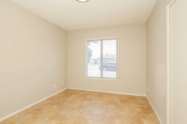 Building Photo - 8720 W Becker Ln