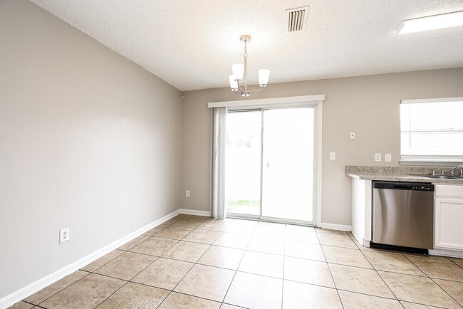 Building Photo - 7909 Cherry Blossom Dr S
