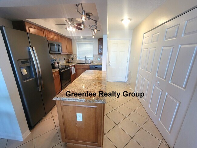 Building Photo - Waterfront Living & Maintenance Free Living at Its Finest – With Views You’ll Never Get Tired Of!