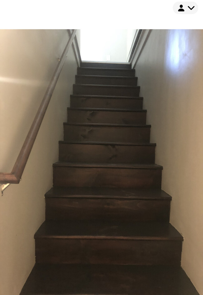 Stairs to bedroom and full bathroom and laundry - 104 Gregory Island Rd