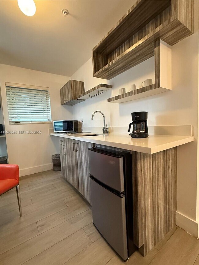 Building Photo - 8320 Harding Ave