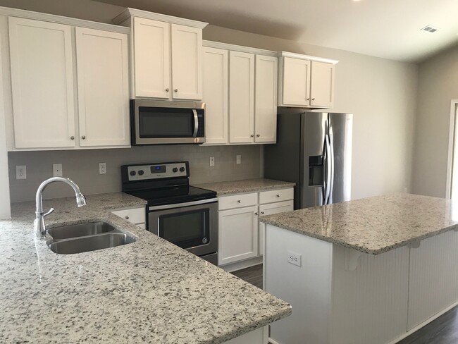 Foto del edificio - 8215 NW Stone Mill Dr