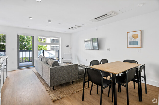 Building Photo - District (Furnished Rooms)