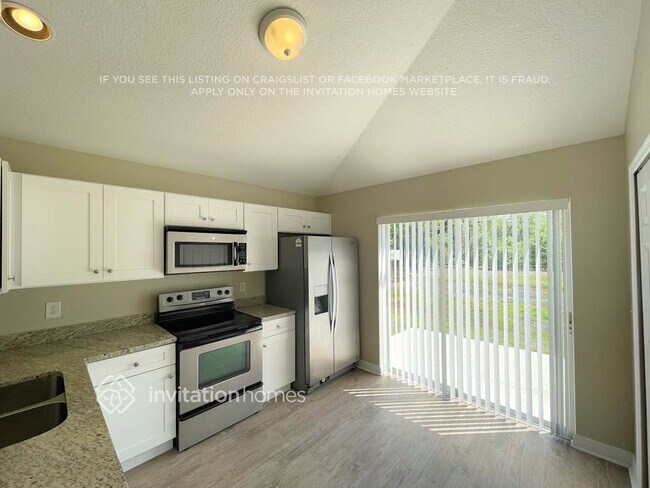 Building Photo - 5943 Sand Key Ln