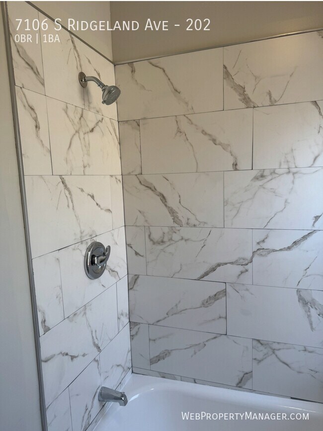 Foto del edificio - 7106 S Ridgeland Ave