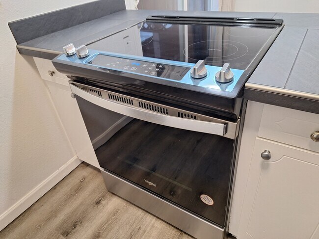 New electric glass top range - 6134 NE Oregon St