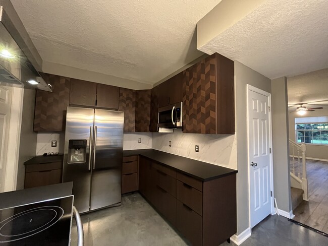 Kitchen with Stainless refrigerator - 13155 Liberty Square Dr