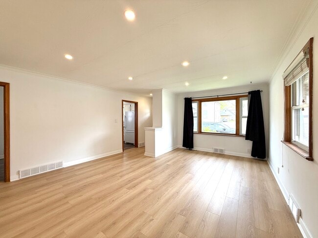 Building Photo - Beautiful 2 Bedroom + Den Main Floor Duplex in St Mary’s