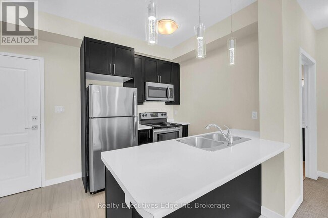 Photo du bâtiment - 125-125 Shoreview Pl