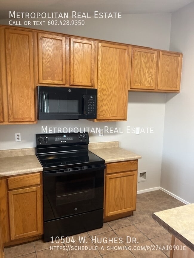 Building Photo - 10504 W Hughes Dr