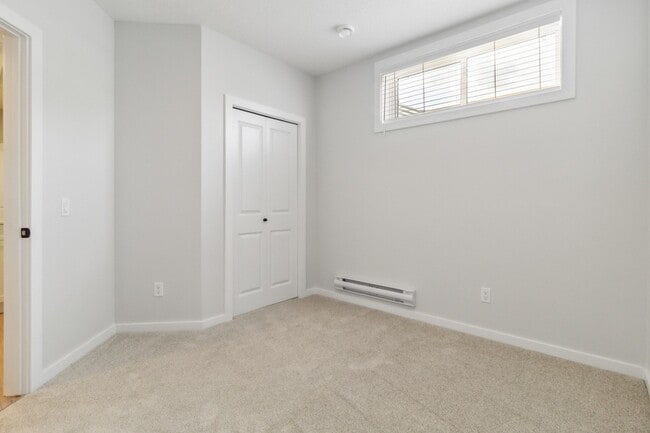 Building Photo - 21003-21025 25 Ave NW