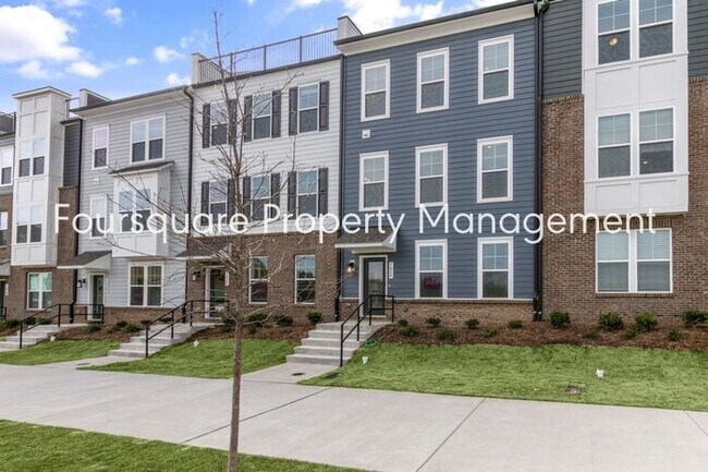 Building Photo - Spacious Townhome with Entry-Level Guest Suite, Washer/ Dryer Included, 2nd floor Balcony & 2-Car...