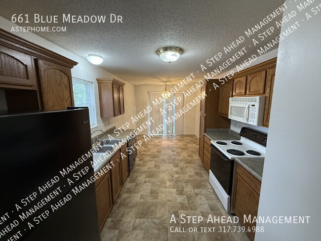 Foto del edificio - 661 Blue Meadow Dr