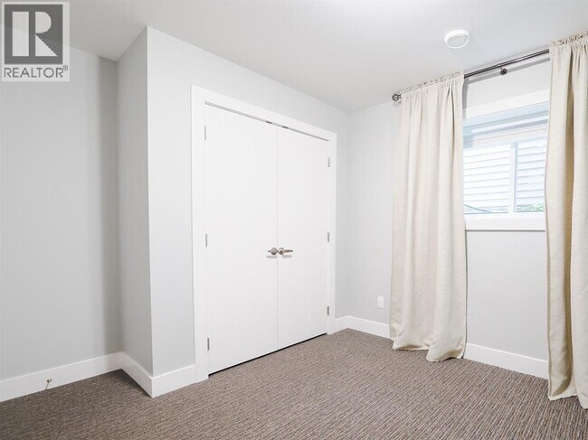 Photo du bâtiment - 24302-2101A 101a Ave