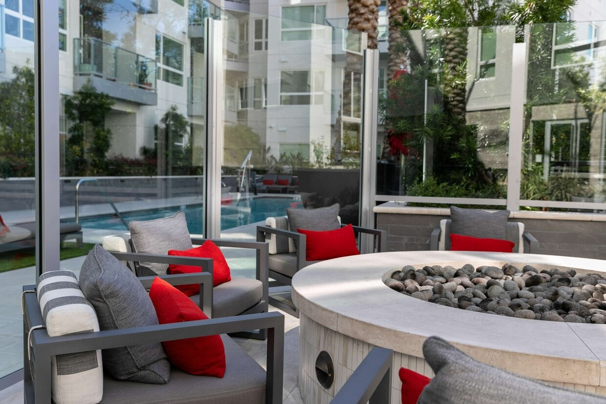 Gather around the fire for cozy evenings outside. - Diridon West