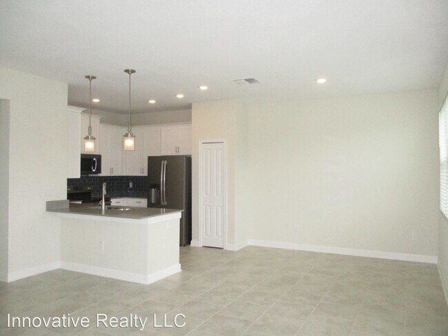 Building Photo - 4 br, 3.5 bath House - 11504 Whistling Pin...