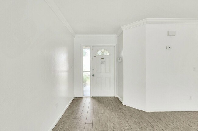 Building Photo - 1612 SE Cascella Ct