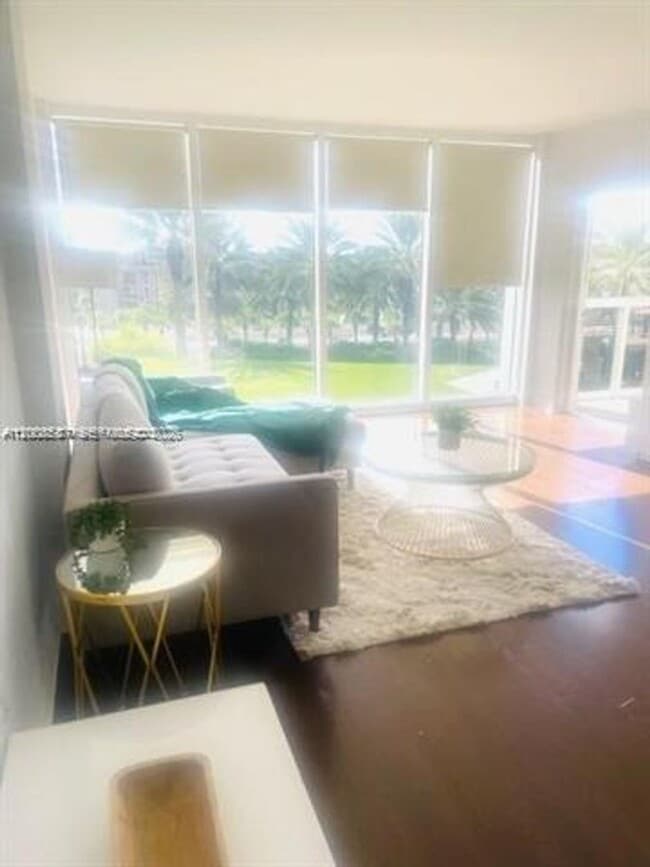 Building Photo - 10275 Collins Ave