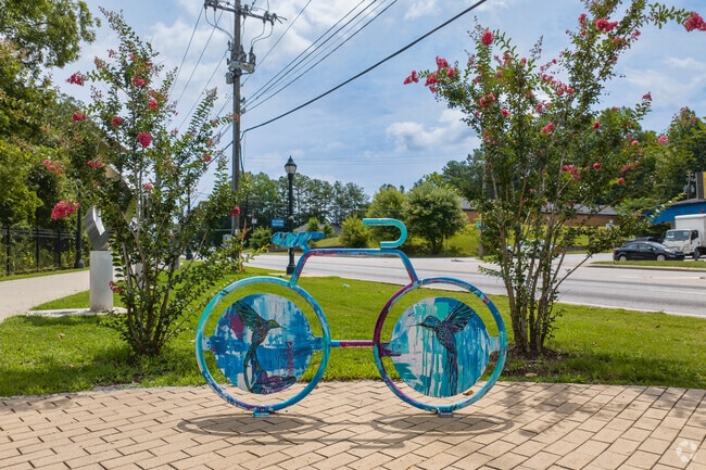 One of the Collier Heights neighborhood artistic sculptors.